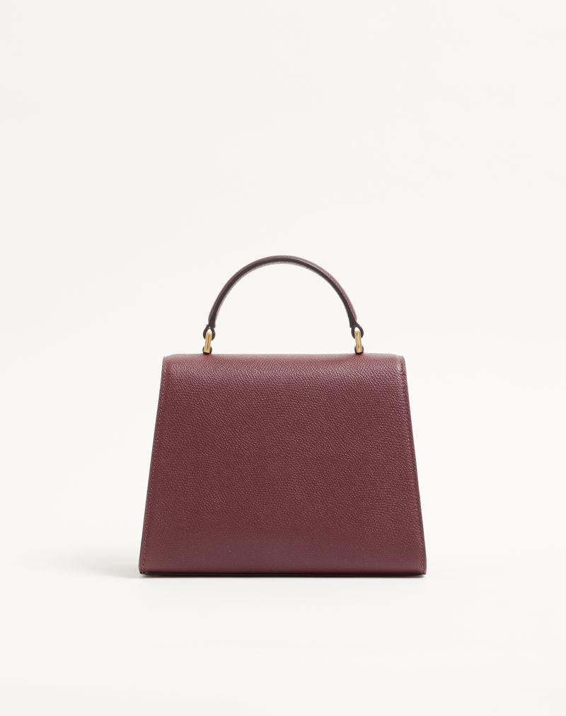 Sac à main Valentino Garavani Vsling petit modèle en cuir de veau grainé avec logo bijou
