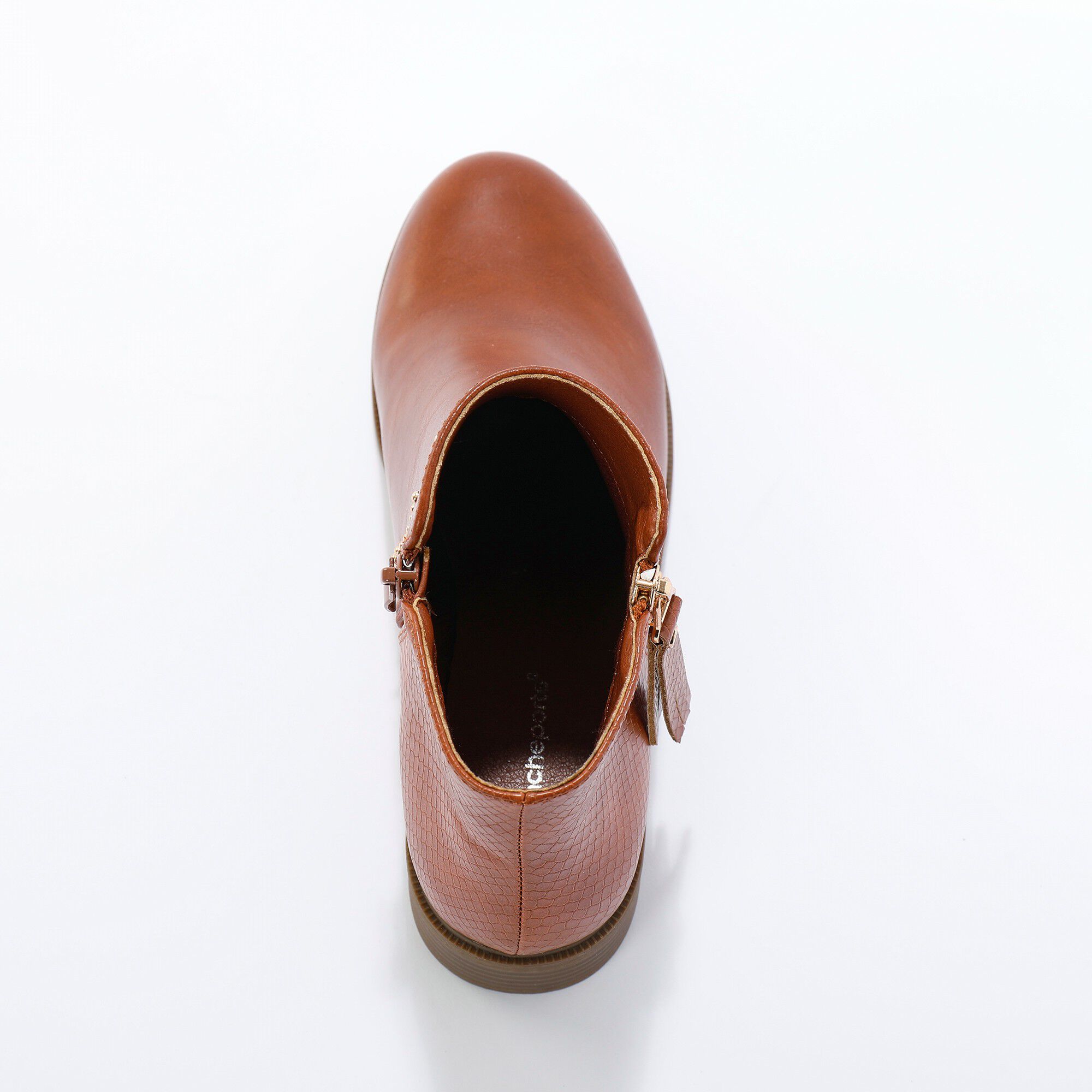 Boots bi-matière, zippées et cloutées