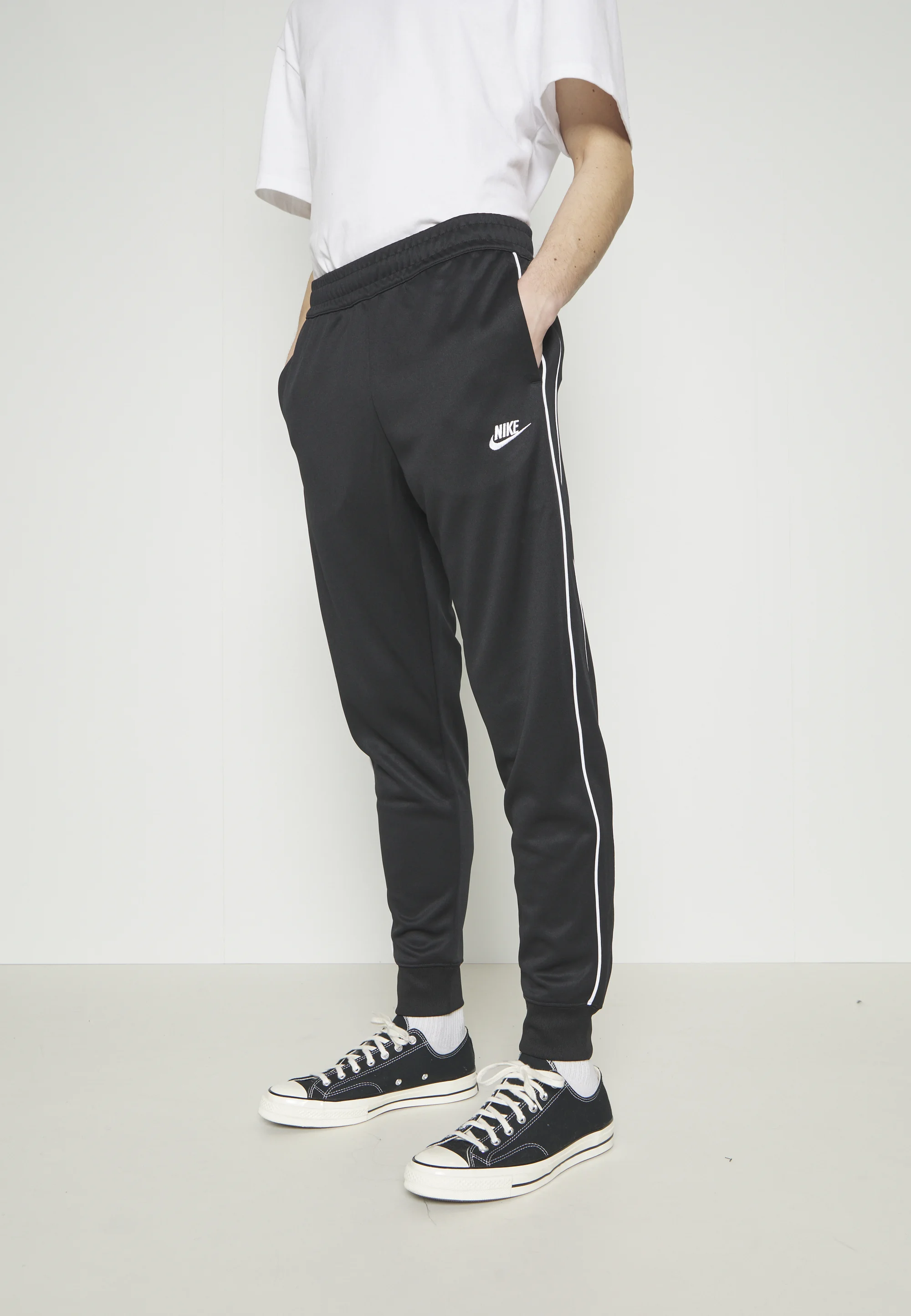 Nike Sportswear CLUB PANT - Pantalones deportivos