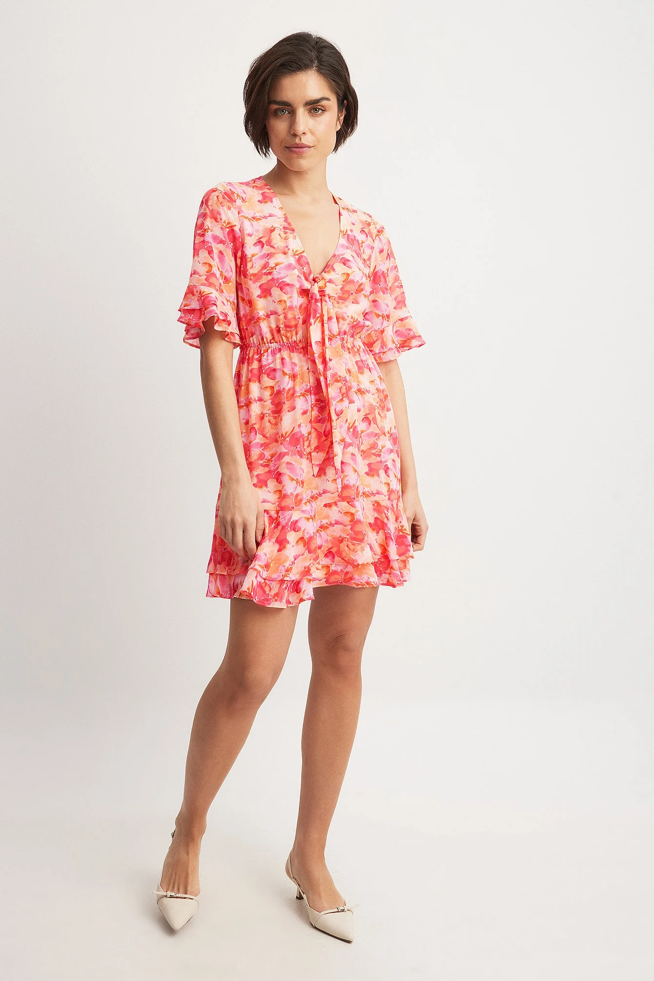 Durchscheinendes Minikleid mit Knotung vorne