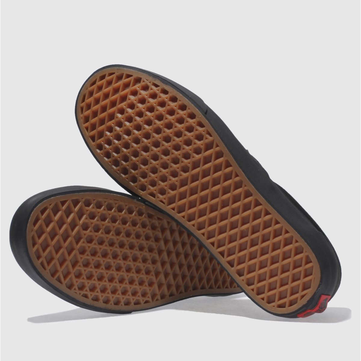 Vans – Klassiska slip-on-sneakers i svart