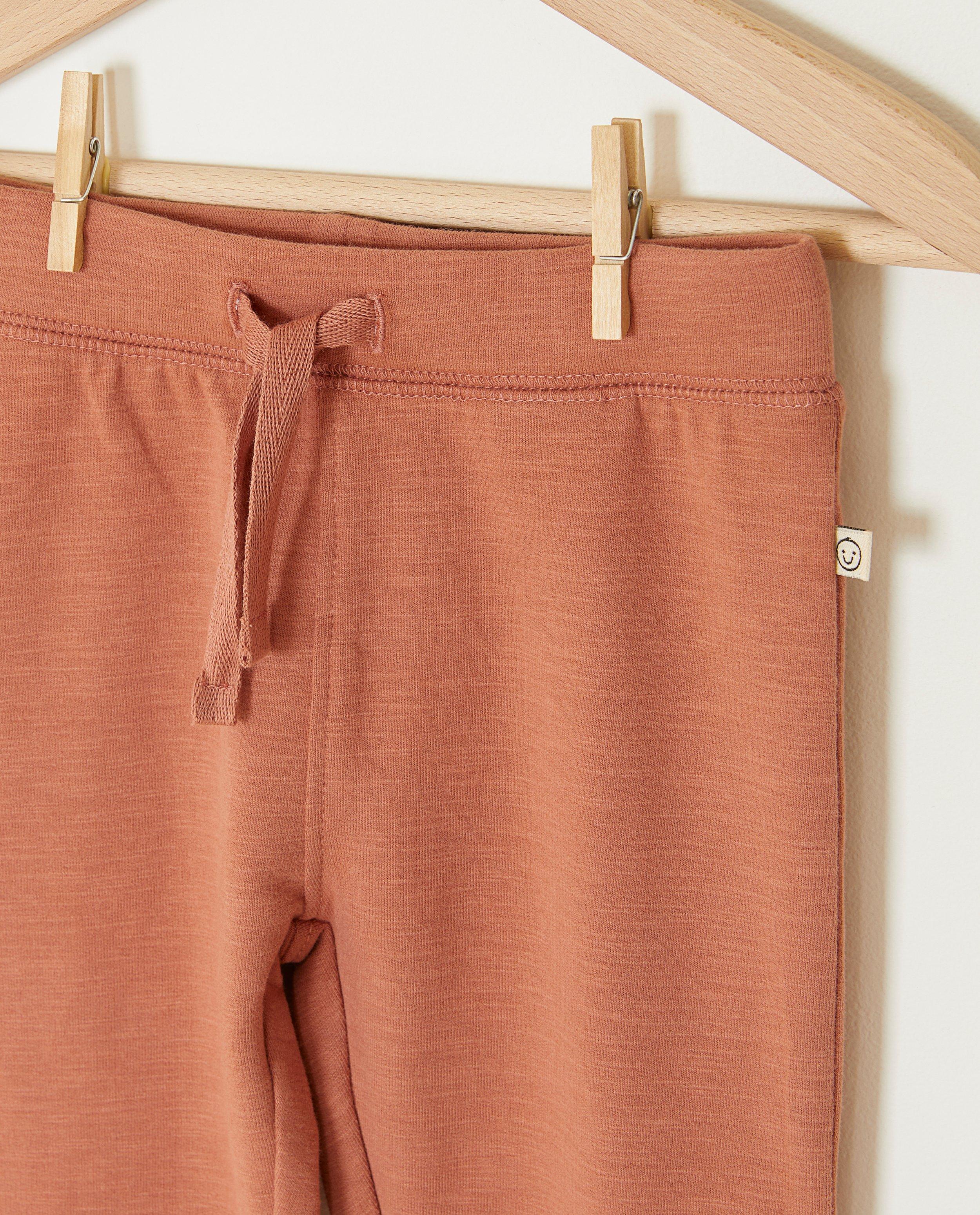 Pantaloni de trening roz, Cuddles and Smiles