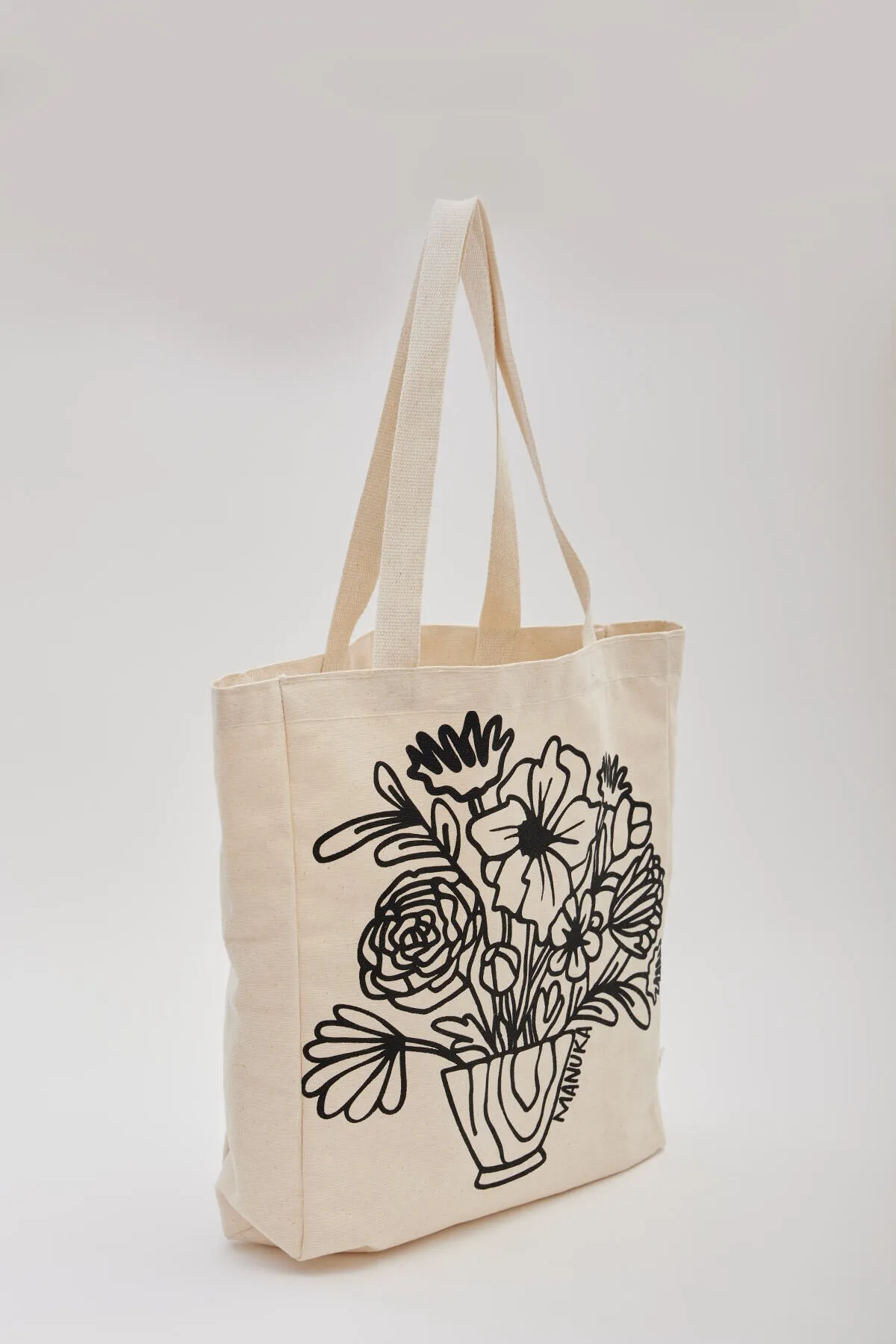 Manuka  BEDRUCKTE GÄSTESTOFFTASCHE BLUME-SCHWARZ