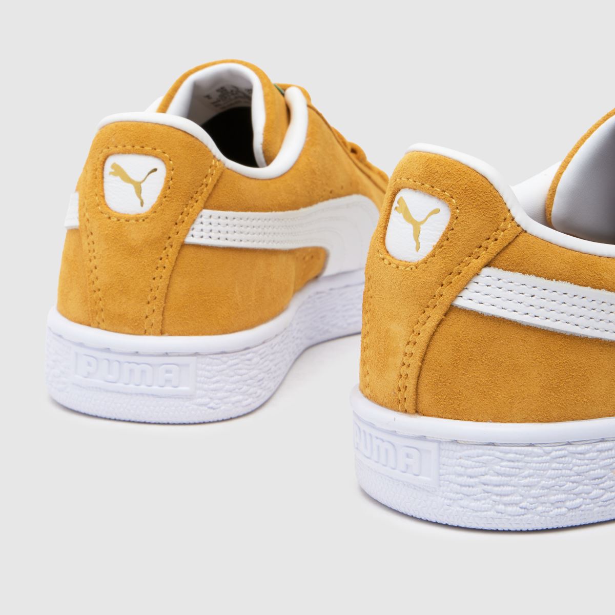 PUMA klassiska mockasneakers i vitt och gult