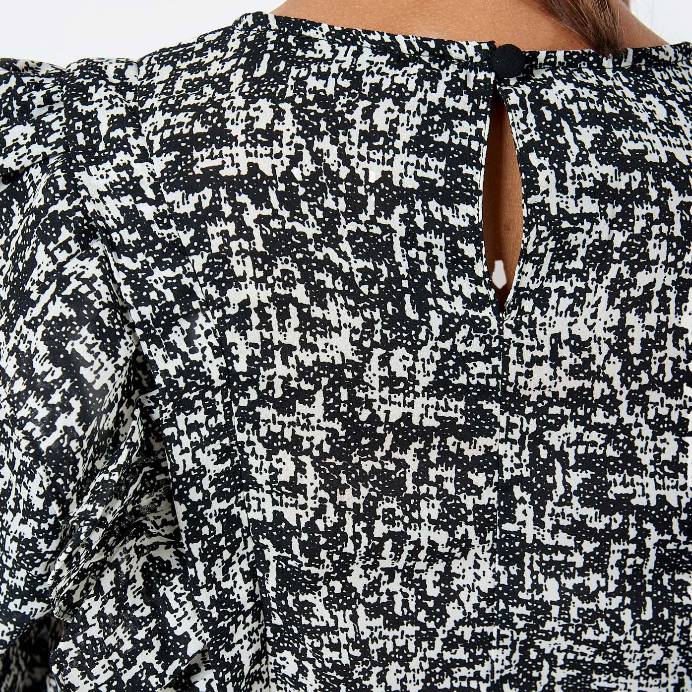 NEXT   Blouse noire et blanche Femme