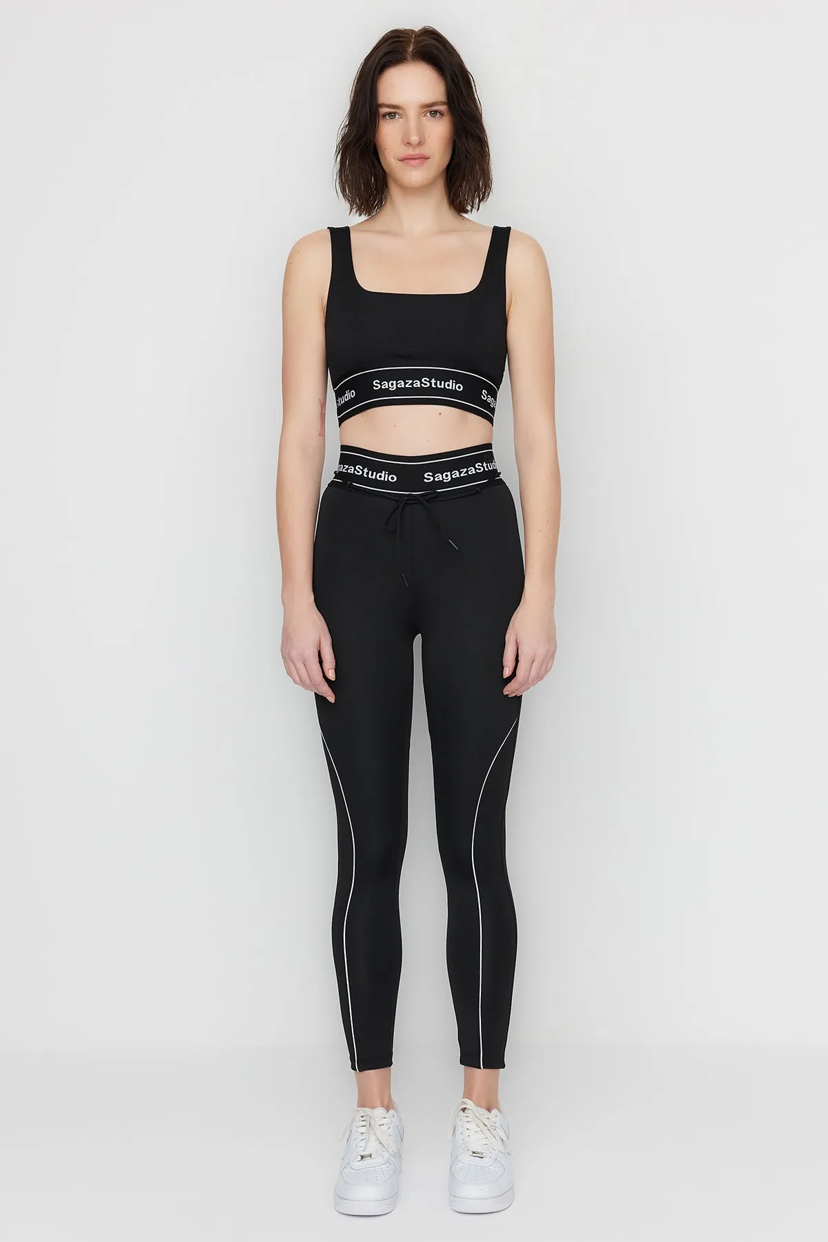 Trendyol Collection  X Sagaza Studio – Schwarze Sport-Leggings mit Kordelzug-Paspelierung und Push-Up-Nähten
