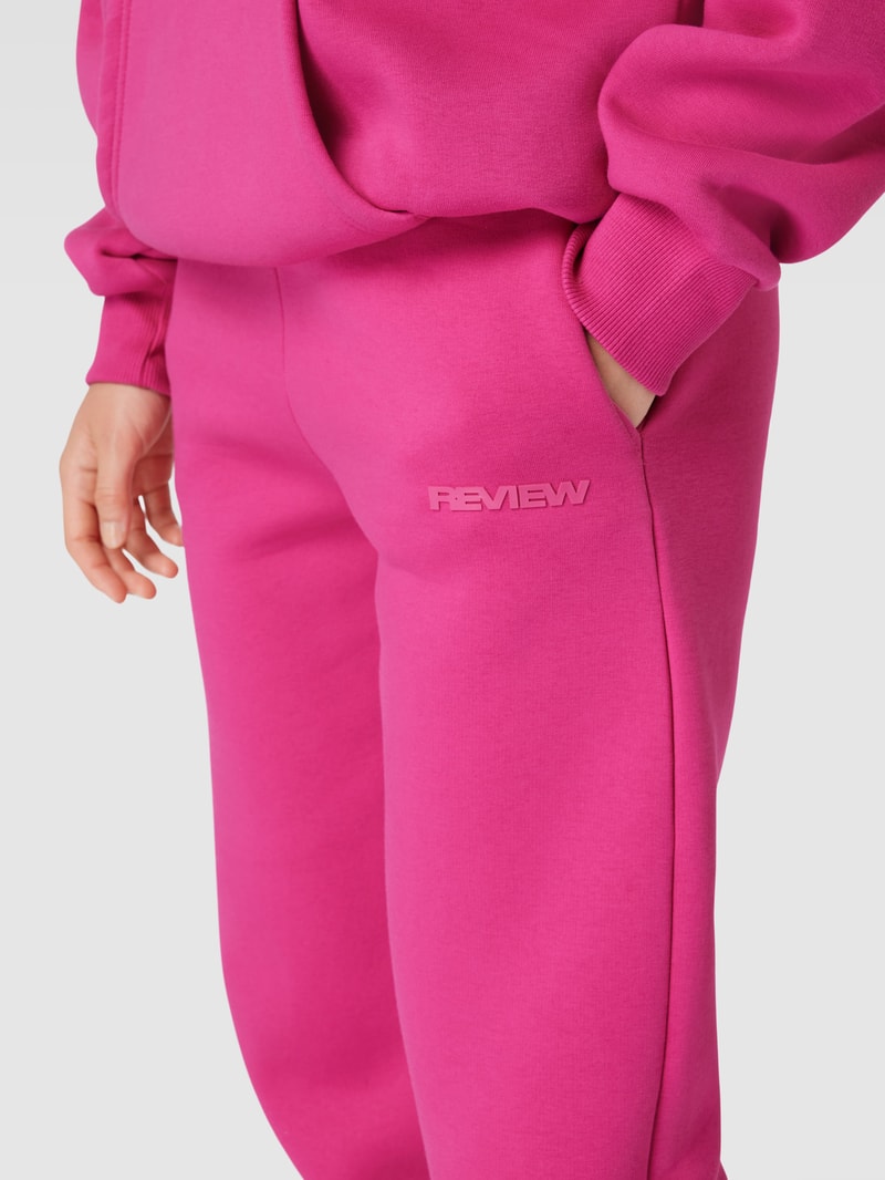 Sweatpants mit Label-Print in fuchsia