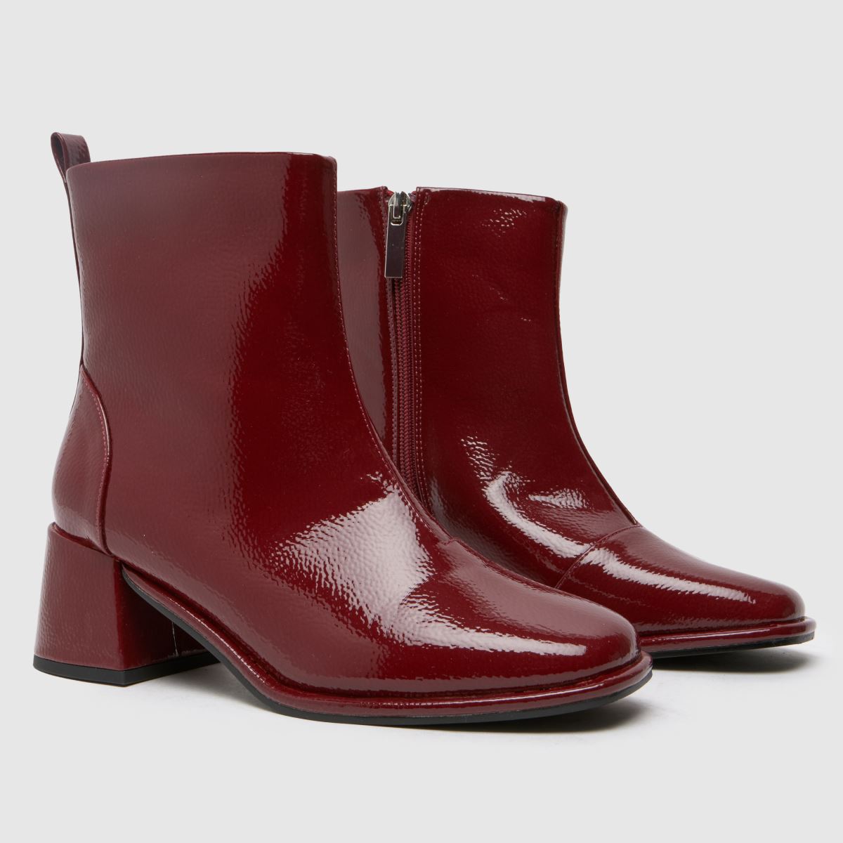 Schuh – Röda ankelboots med bred passform och bowie-blockmönster