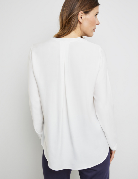 Fließende Bluse mit Kellerfalte
