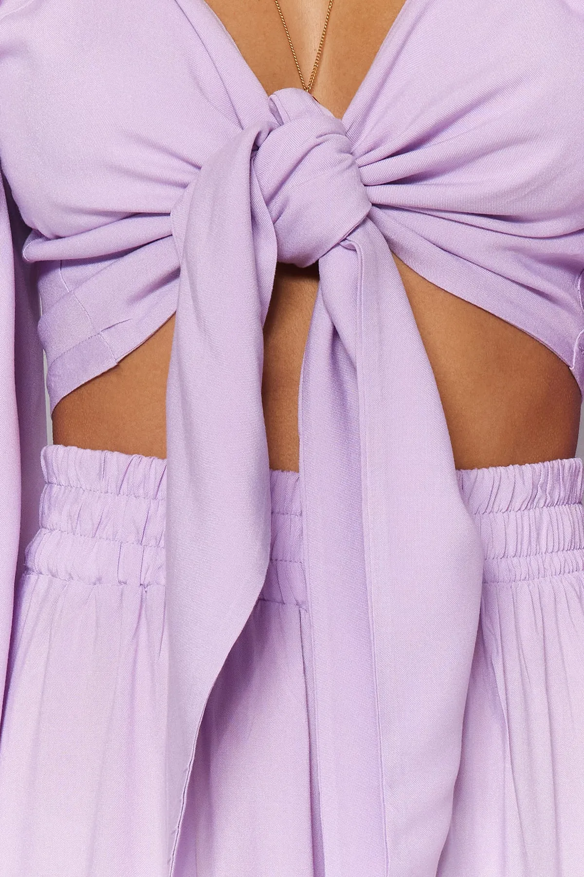 Trendyol Collection  Lilafarbener, gewebter Blusen-Hosenanzug mit Bindeband TBESS23AU00072