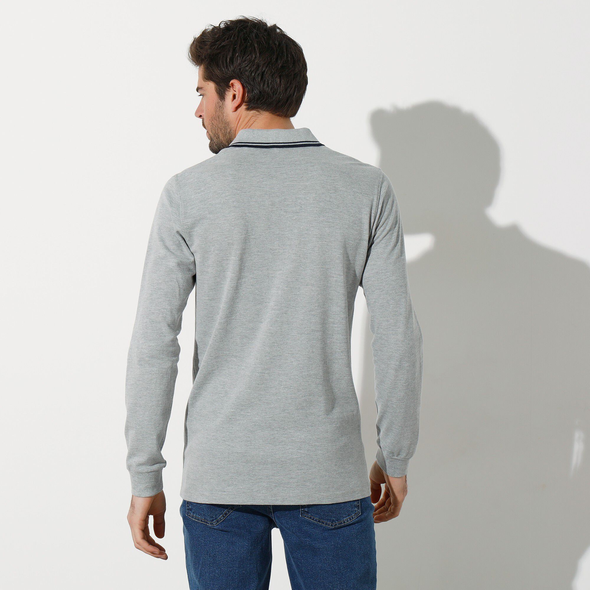 Polo uni maille piquée manches longues