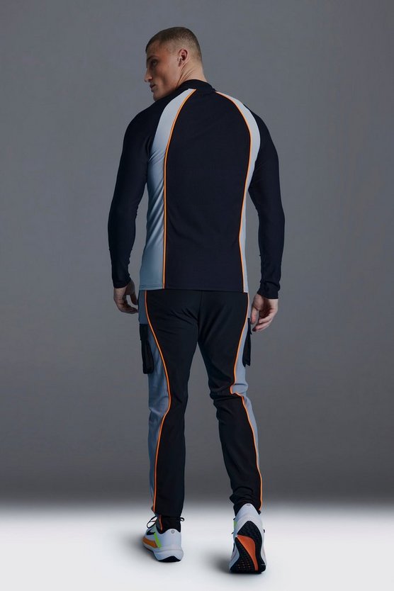 Man Active Slim-Fit Colorblock Trainingsoberteil mit 1/4 Reißverschluss
