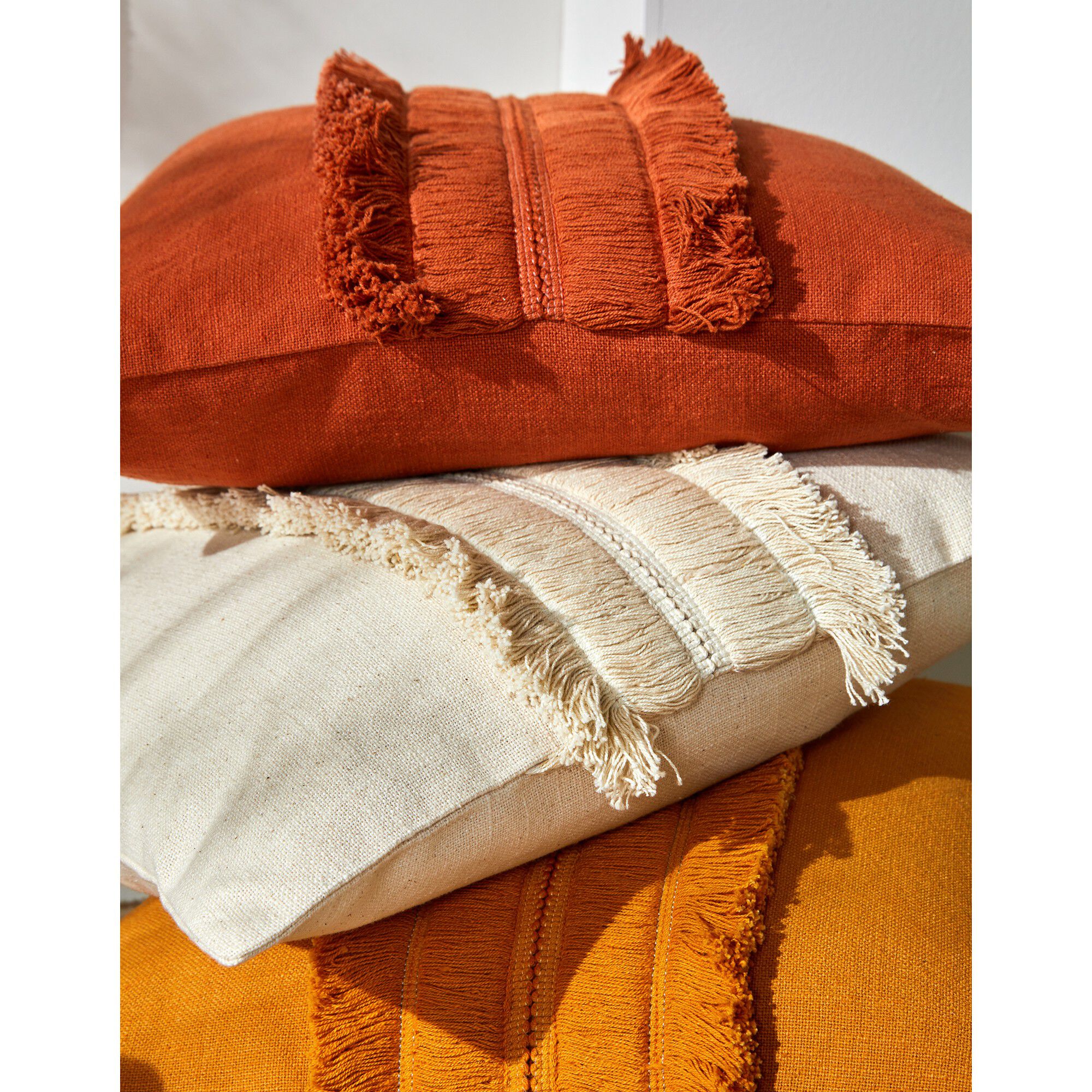 Coussin avec galon franges
