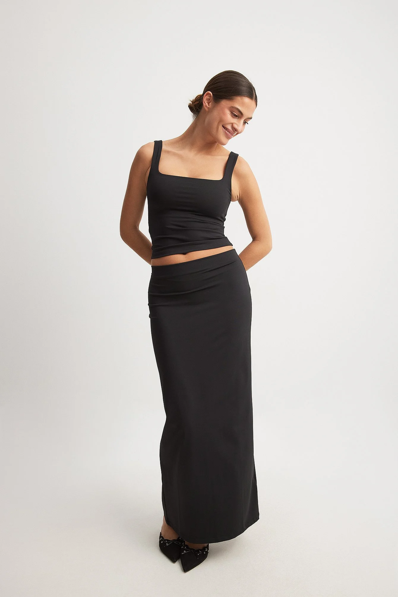Eng anliegender Rock mit niedriger Taille