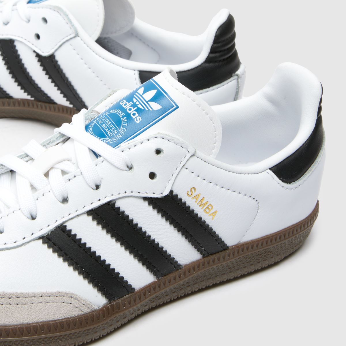 Adidas fehér és fekete samba és Junior edzőcipők