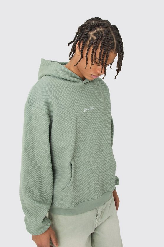 Kastiger Oversize Hoodie mit Stickerei
