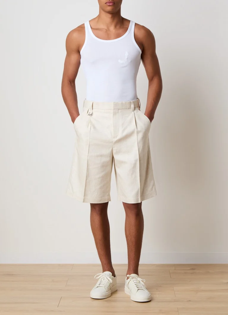 Pantaloni Jacquemus cu croi larg și crop, din amestec de in cu dungi în relief.