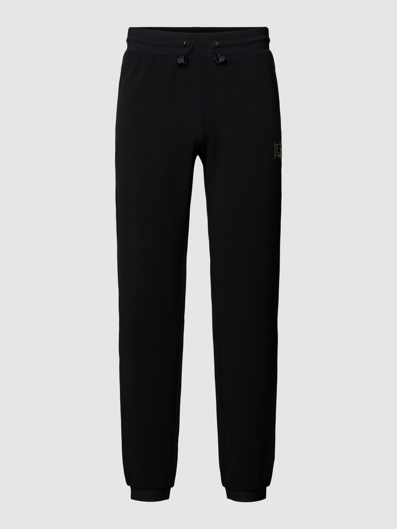 Sweatpants im fein strukturierten Design in schwarz