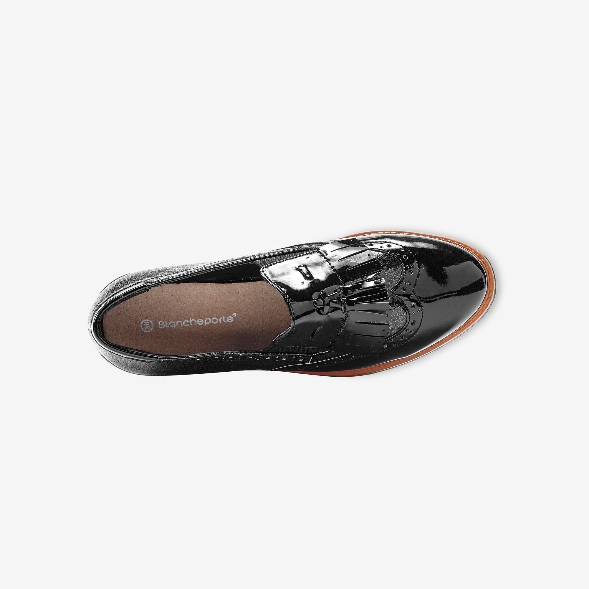 Mocassins compensés à franges et pompons