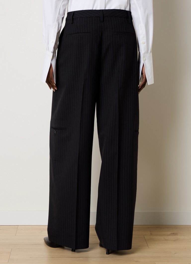 Pantaloni a vita alta e gamba larga di Acne Studios in misto lana a righe sottili.