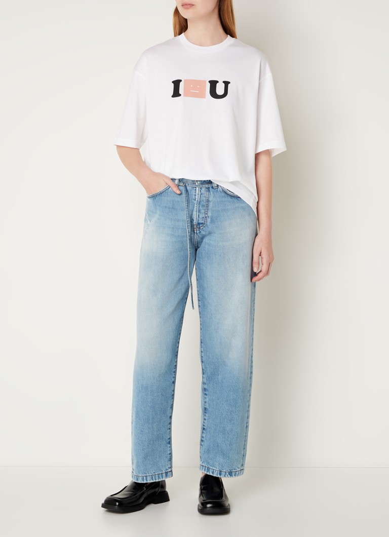 Jeans Acne Studios a vita alta e vestibilità ampia, lavaggio chiaro, con cintura.