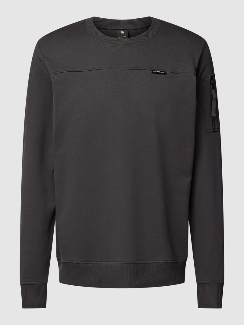 Sweatshirt mit Reißverschlusstasche am Ärmel in anthrazit