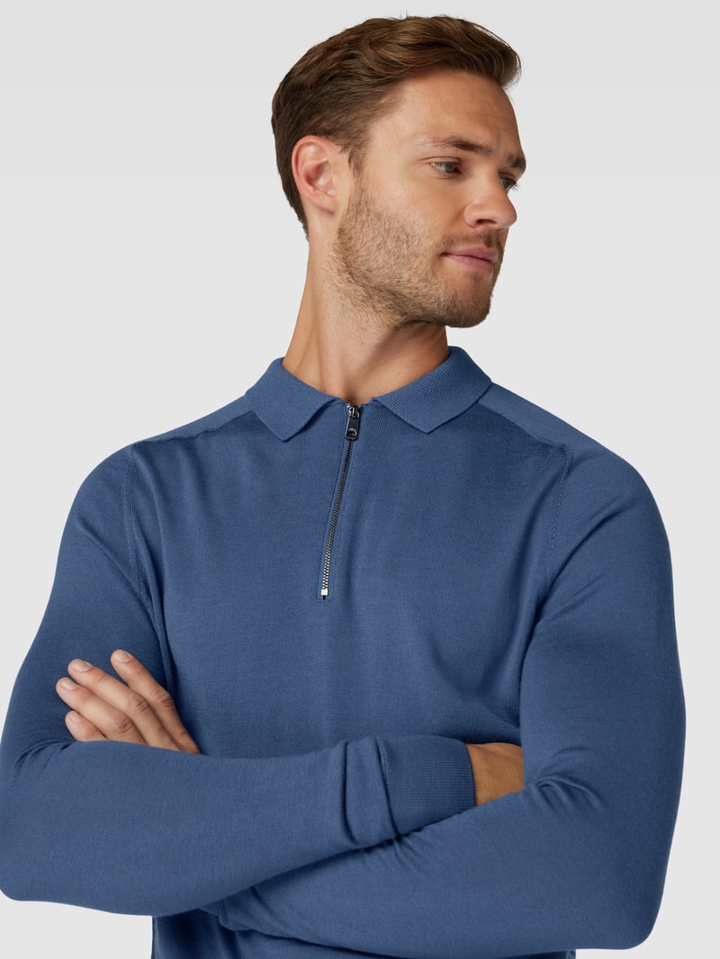 Pullover mit Polokragen aus Schurwolle in hellblau