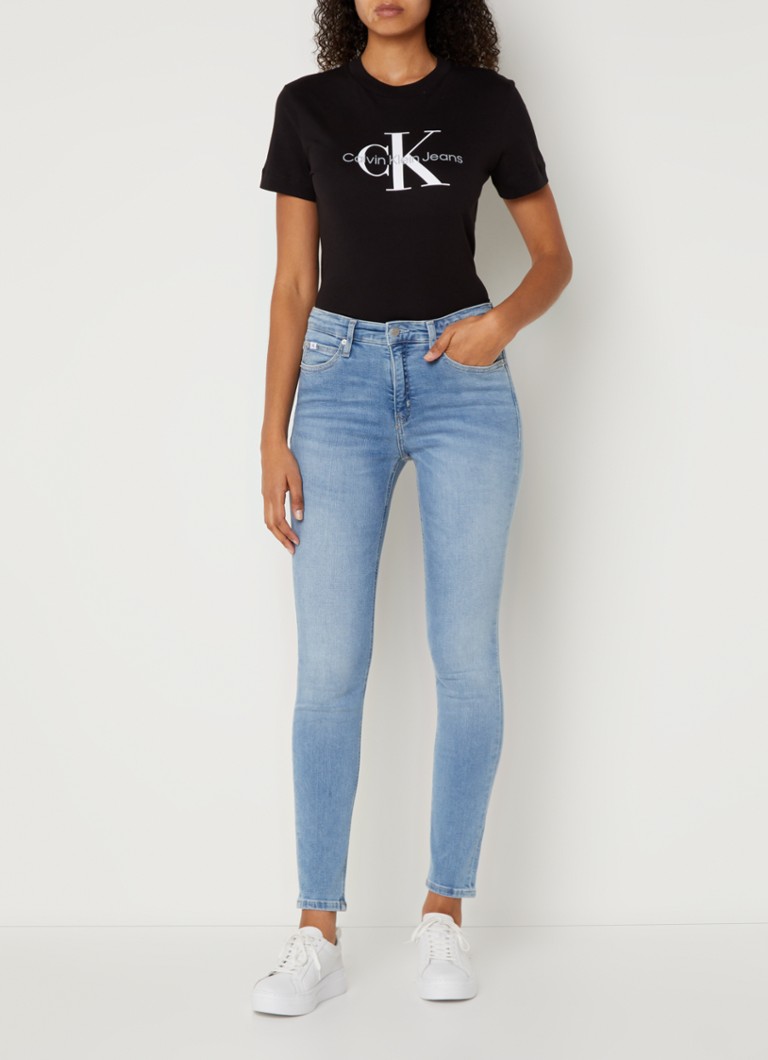 Jeans skinny a vita media Calvin Klein, lavaggio chiaro