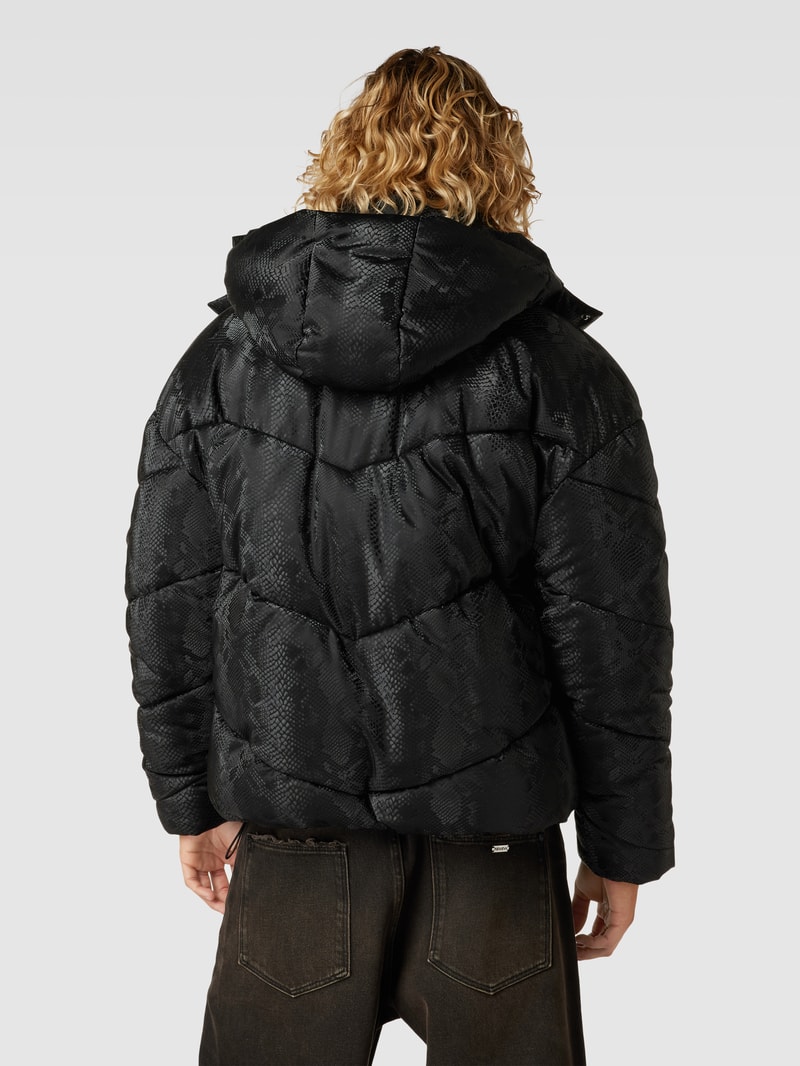 Steppjacke mit Schlangenmuster in schwarz