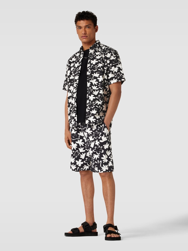 Shorts mit Allover-Muster in schwarz