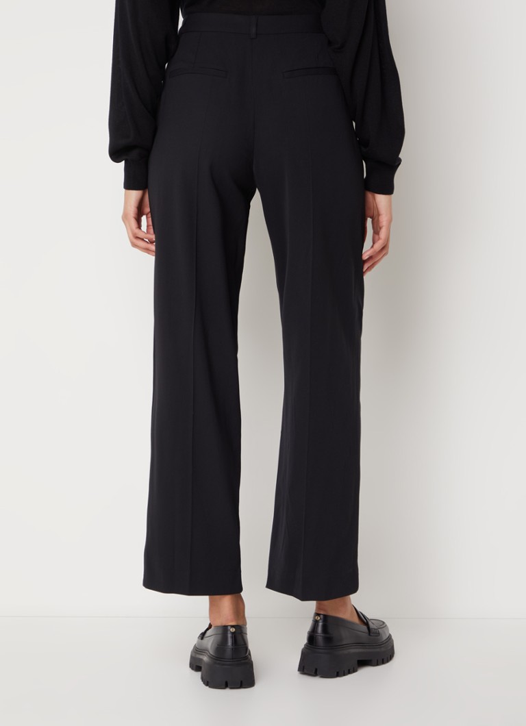 Pantaloni Gona de la ba&sh cu talie înaltă și croială lată, cu talie evazată la bază.