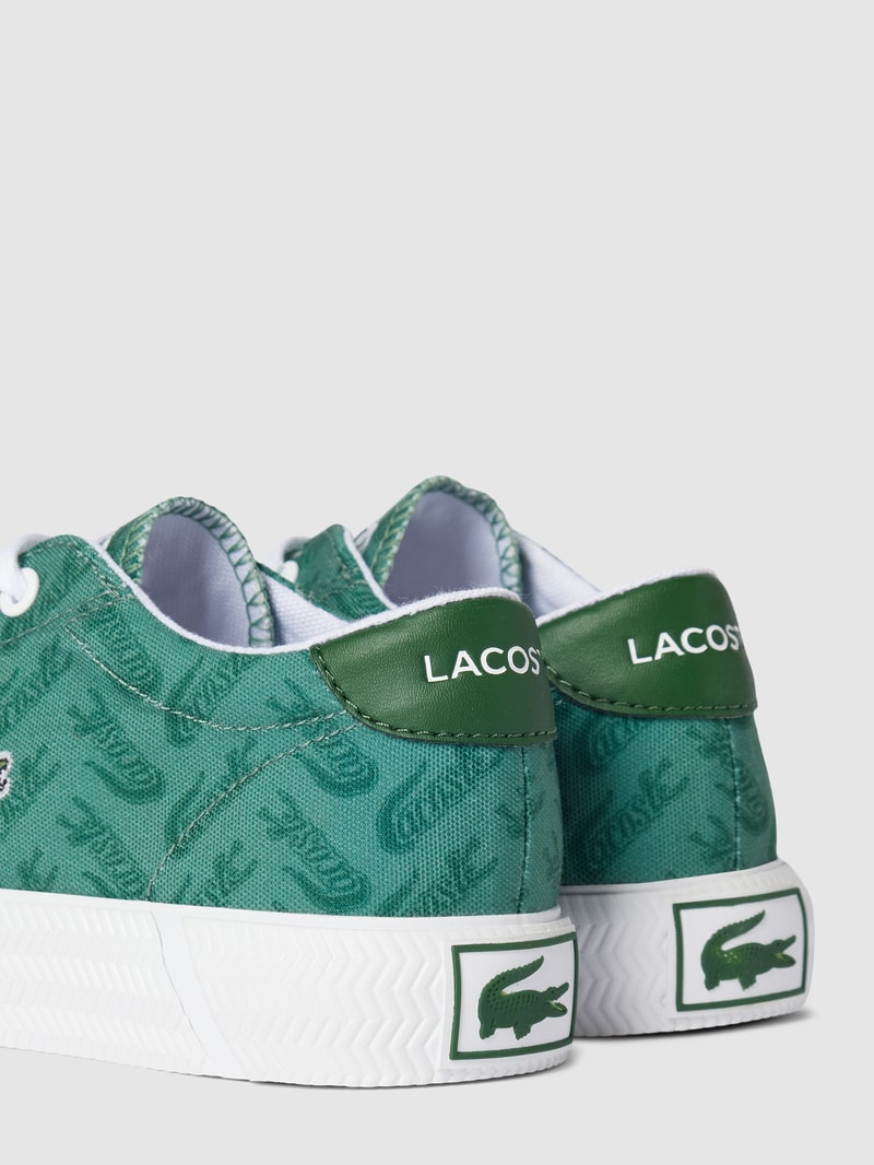 Sneaker mit Logo-Muster in dunkelgrün
