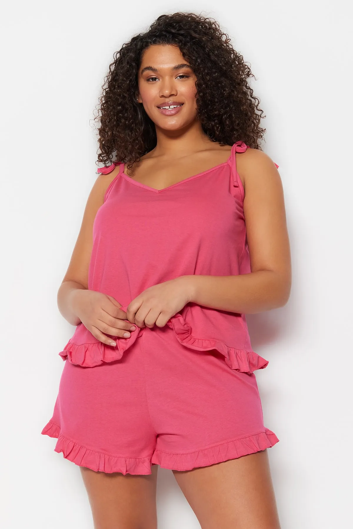 Trendyol Curve  Fuchsiafarbenes Pyjama-Set mit Strick- und Schnürdetails TBBSS22PT0564