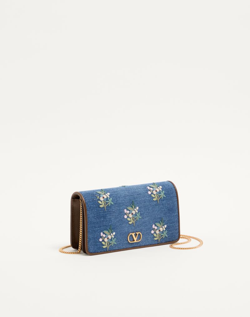 Valentino Garavani Mini bolsa de ombro VLogo Signature em jeans com bordado floral