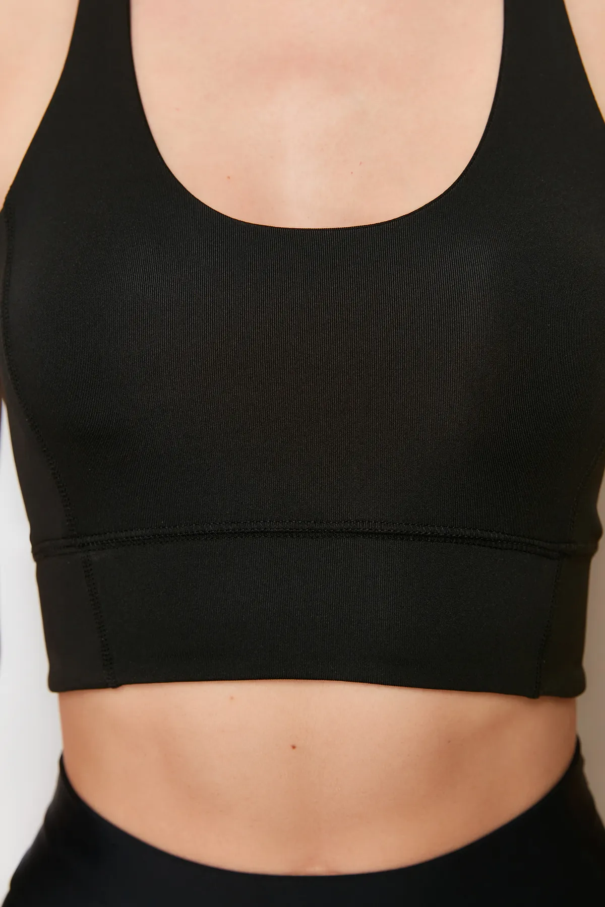 Trendyol Collection  Schwarzer gestützter/formender Neckholder-Sport-BH aus Strick THMSS24SS00032