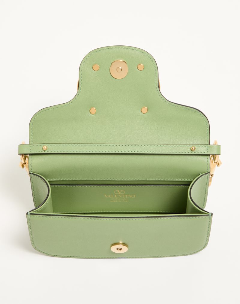 Bolsa de ombro pequena Valentino Garavani Locò com logotipo de joia