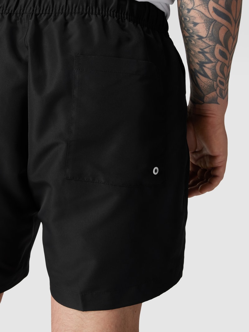 PLUS SIZE Badehose mit Label-Print in schwarz