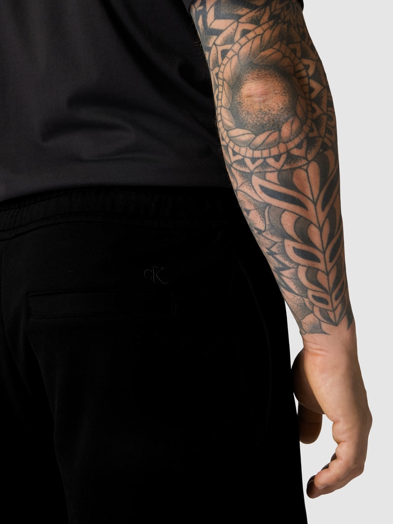 PLUS SIZE Sweatshorts mit Label-Print Modell 'PLUS DYNAMIC' in schwarz