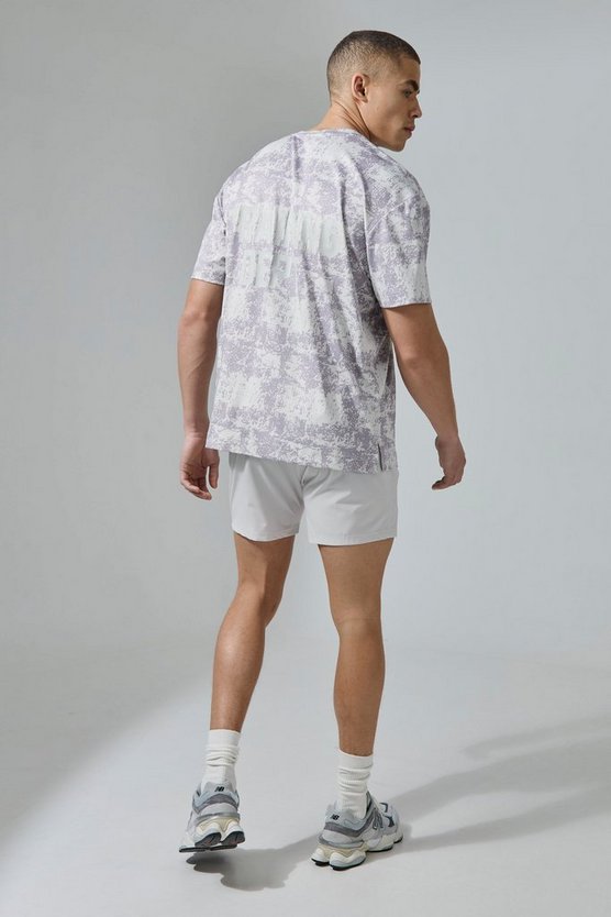 Oversize Camouflage T-Shirt mit Active Training Dept Print