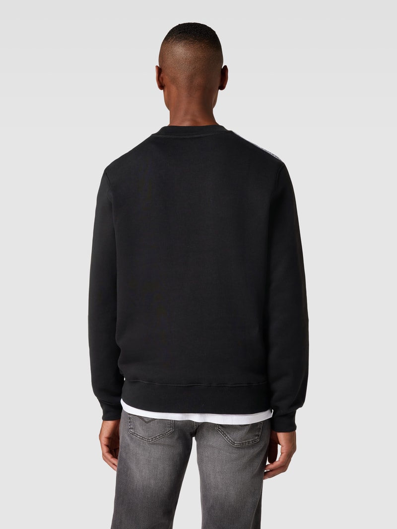 Sweatshirt mit Rundhalsausschnitt Modell 'TAPE CREW' in schwarz