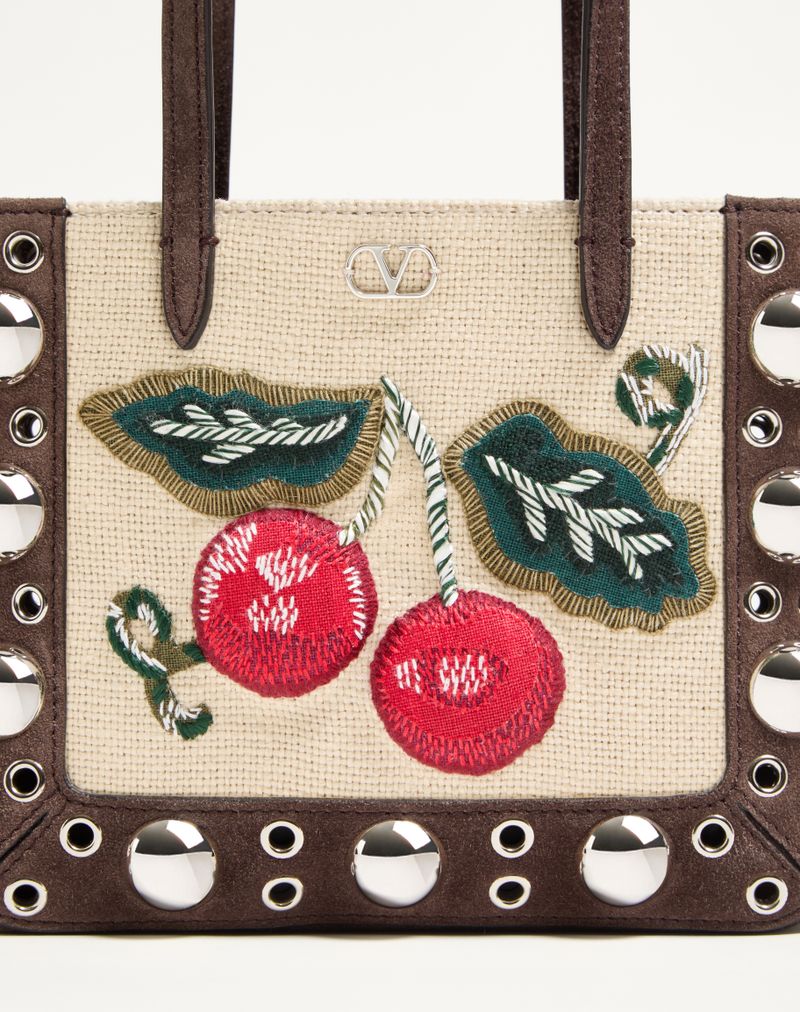Bolsa de compras mini Valentino Garavani Nellcôte bordada com motivo de cereja.