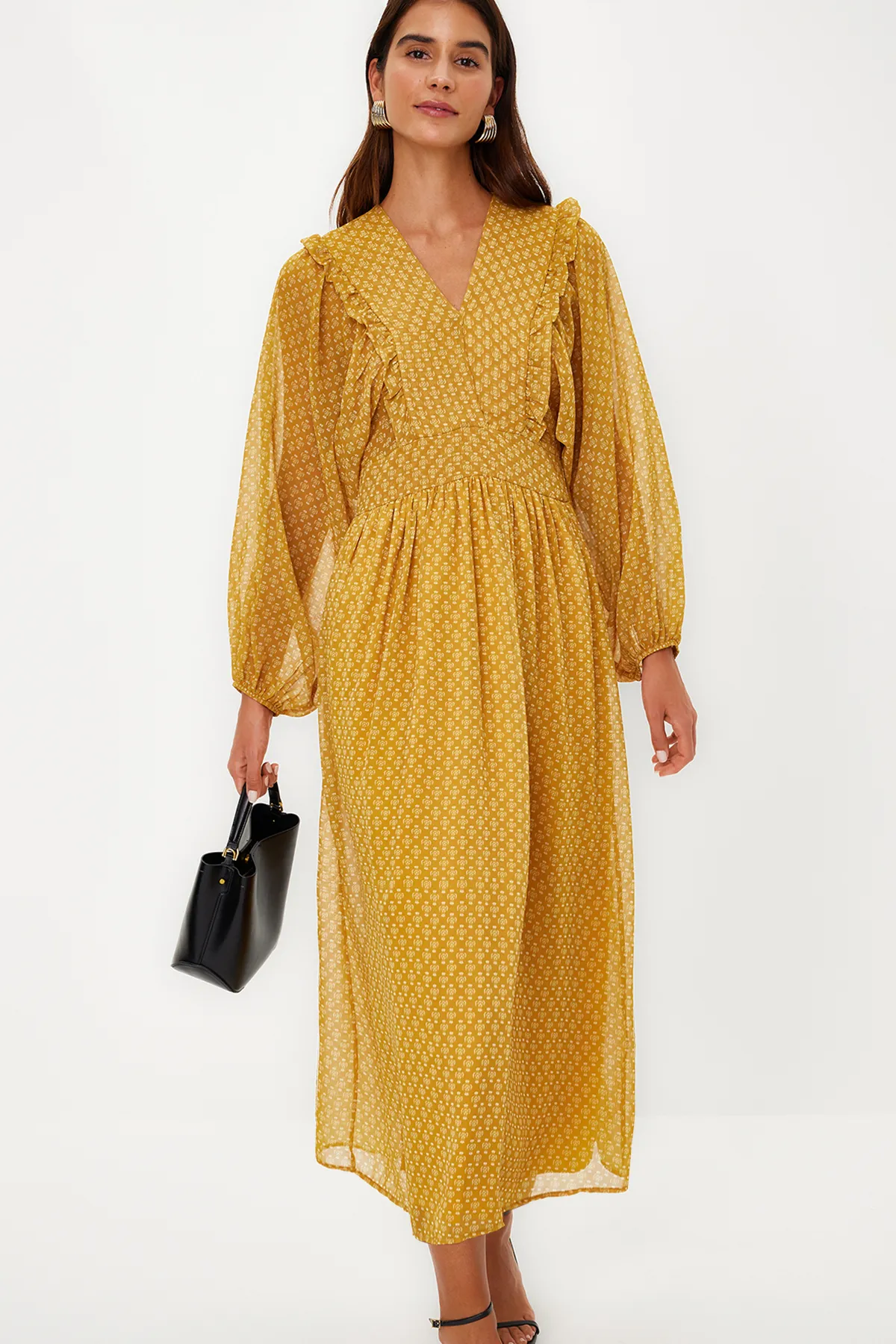 Trendyol Modest  Senfgelbes, minimal gemustertes, mit Chiffon gefüttertes Webkleid TCTSS24EB00035