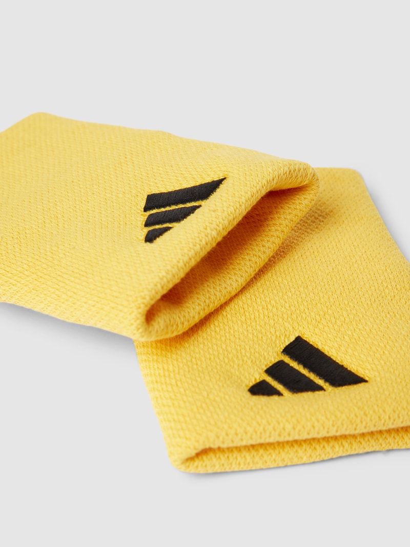 Schweißband mit Label-Stitching Modell 'TENNIS' in gold