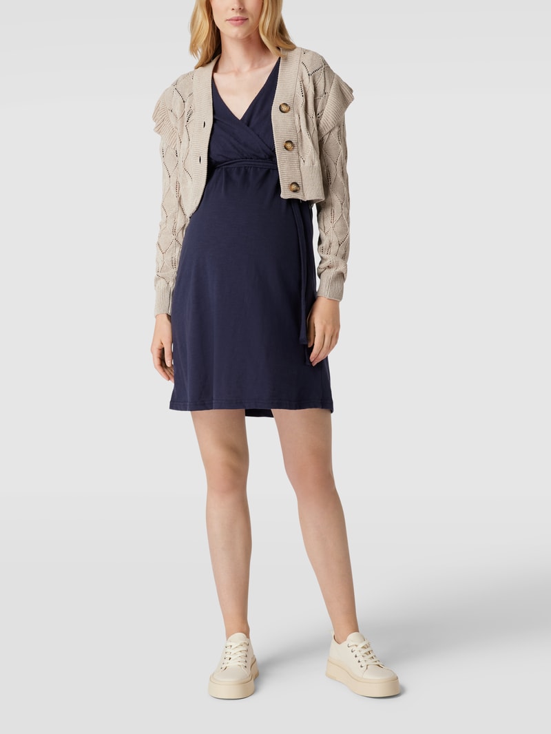 Umstands-Strickjacke mit Zierbesatz in beige