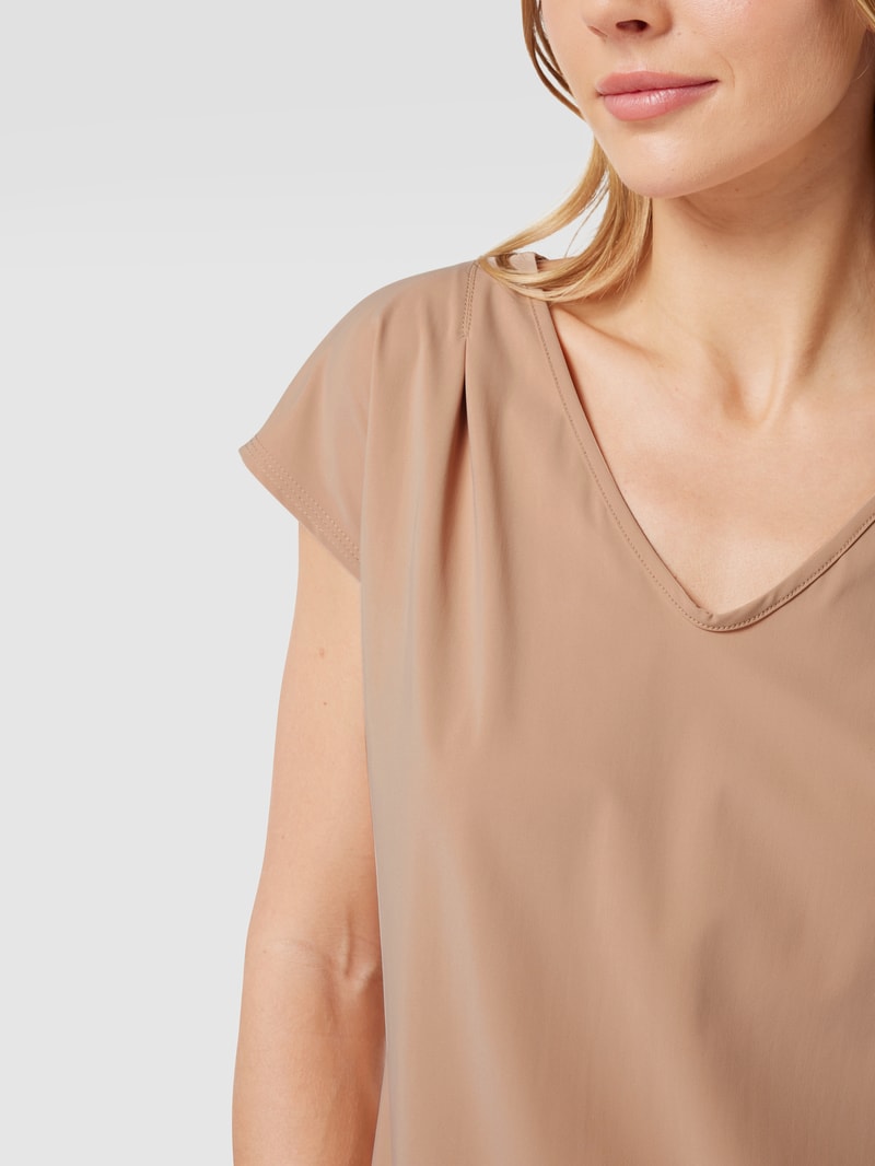 Jumpsuit mit seitlichen Eingrifftaschen Modell GIRA JUMPY in beige