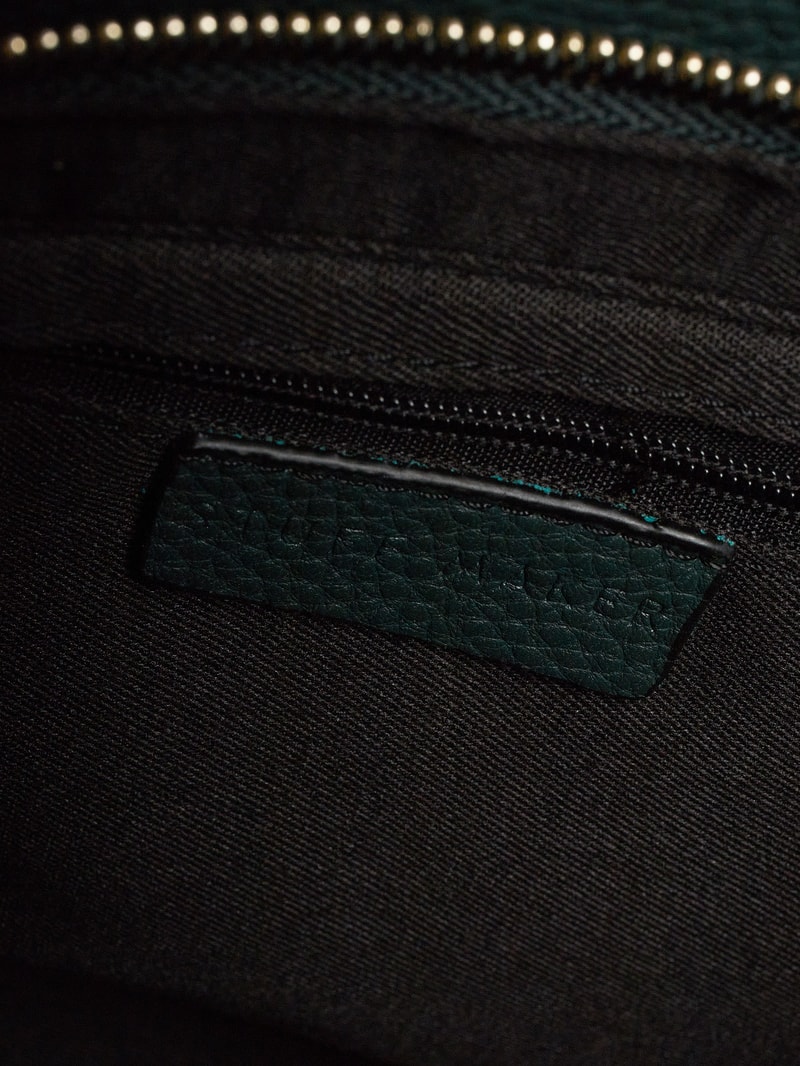 Handtasche aus Leder in bottle