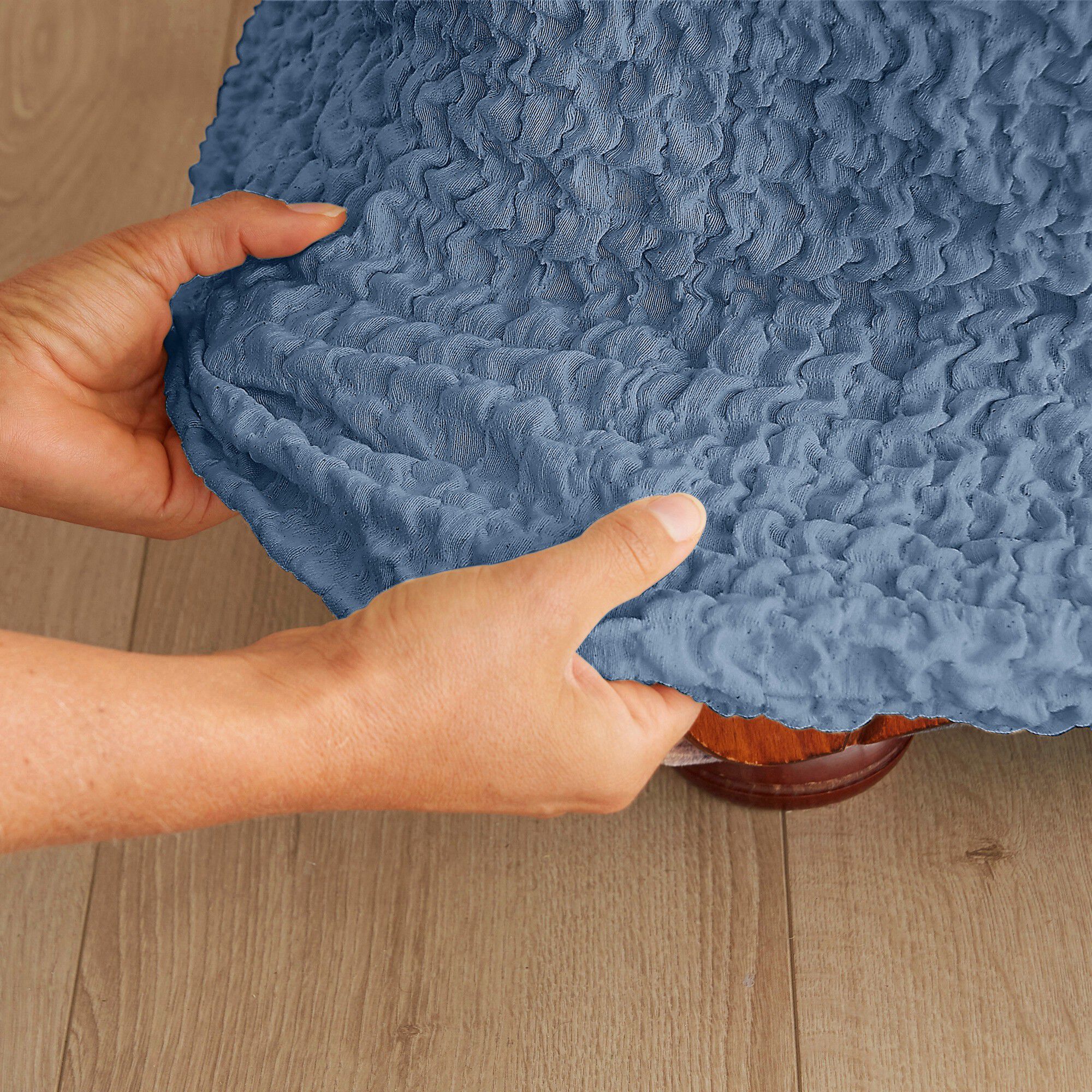 Housse gaufrée bi-extensible canapé fauteuil accoudoirs
