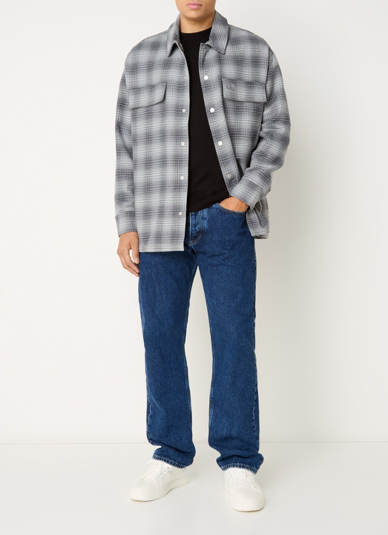 Cămașă Calvin Klein în carouri, croială clasică, cu buzunare la piept.