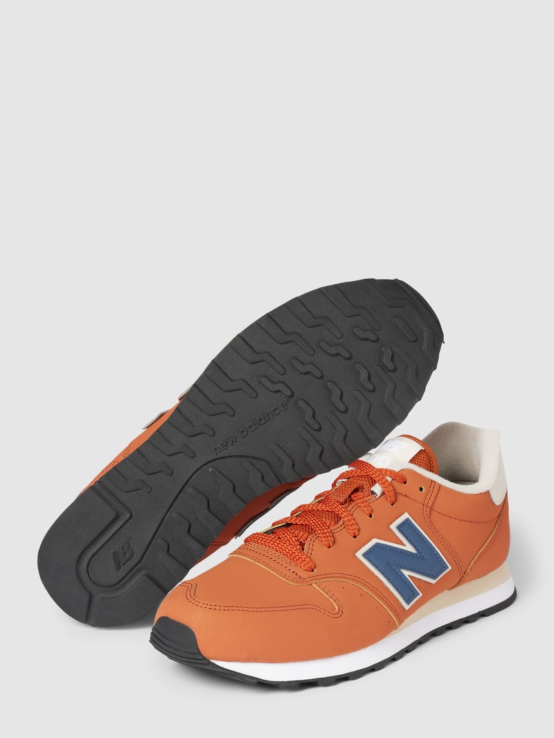 Sneaker mit Label-Detail in dunkel orange