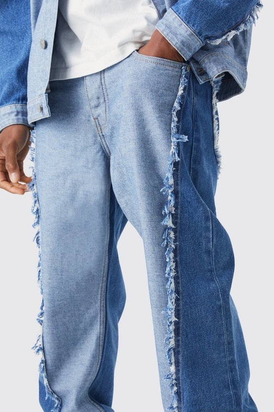 Lockere gespleißte Jeans mit ausgefranstem Saum